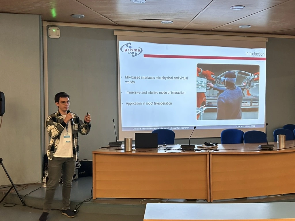 Matt Novoselov presenting visionOS research at the International Conference on Social Robotics 2025
